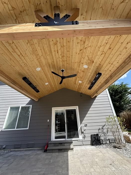 Cedar patio ceiling in Maple Valley with a ceiling fan and recessed lighting