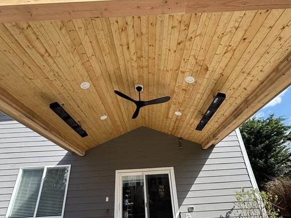 Cedar patio ceiling in Maple Valley with a ceiling fan and recessed lighting